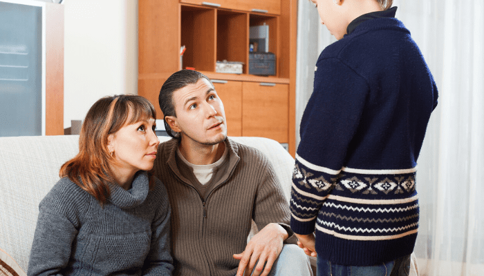 Parents talking to daughter about raising responsible adults