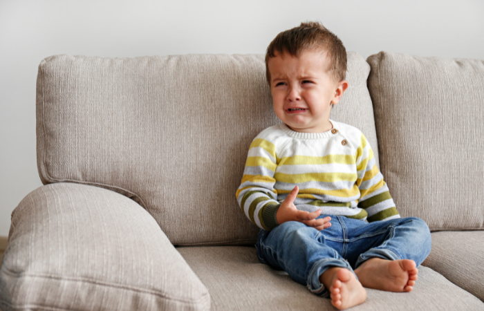 Toddler boy on couch crying tips for taming tantrums