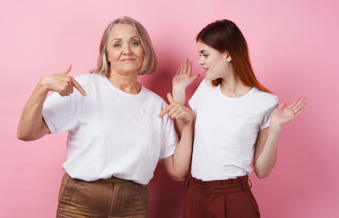 how to get a teenager to talk about their feelings - mom and daughter dressed the same