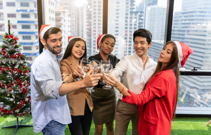 group of people making a toast