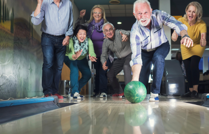 bowling with a twist : senior citizen bowing