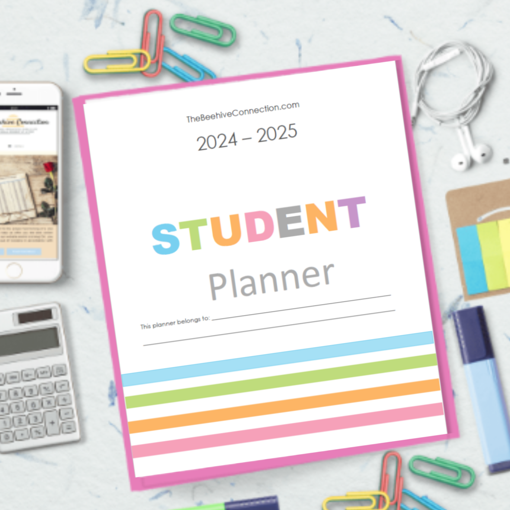 student planner printable pink binder on table