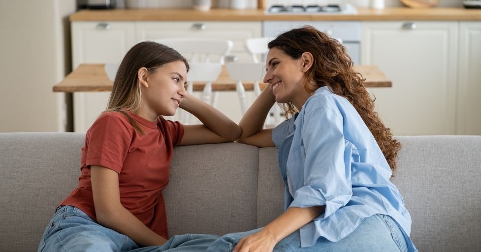 mom talking to daughter