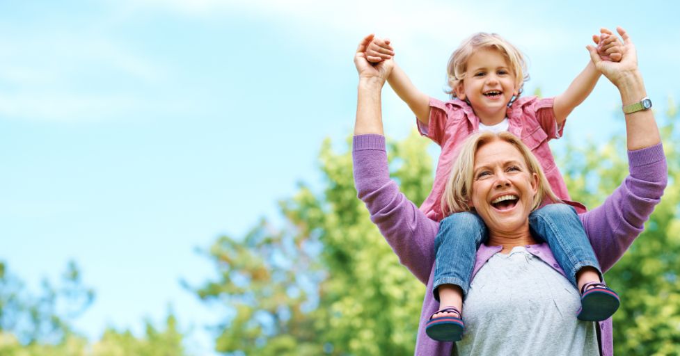 mom and son on her shoulders