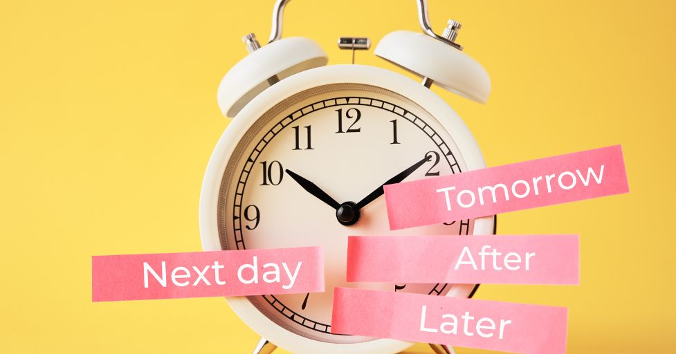 clock with post it notes that say next day, tomorrow, after, and later for logical consequences examples of procrastination