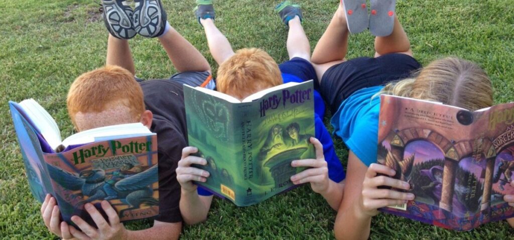 local family fun ideas - kids reading Harry Potter books