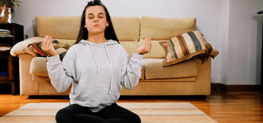 teen girl in a yoga pose