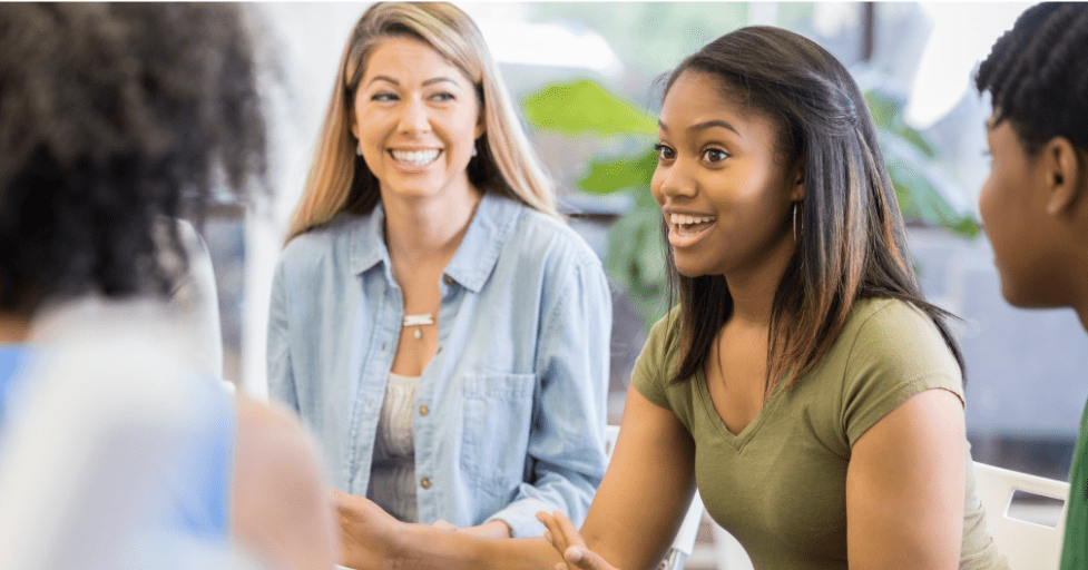 Activities for Teenagers on Self-Esteem group of teens talking to each other