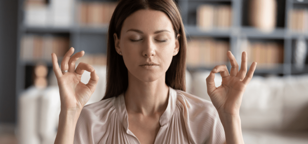 woman doing yoga and breathing