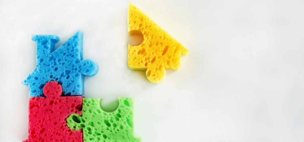 four sponge puzzle pieces that make a house