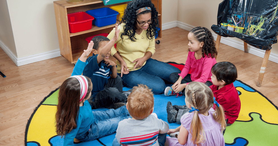 morning routine kindergarten young children in a classroom in a circle
